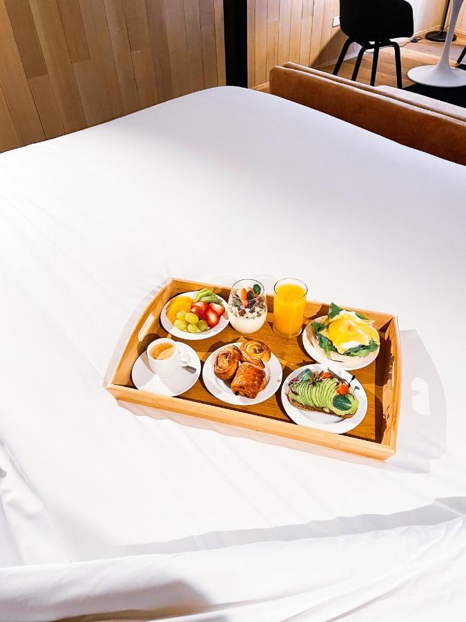 Hotel Magnolia Santiago Exterior foto A breakfast tray