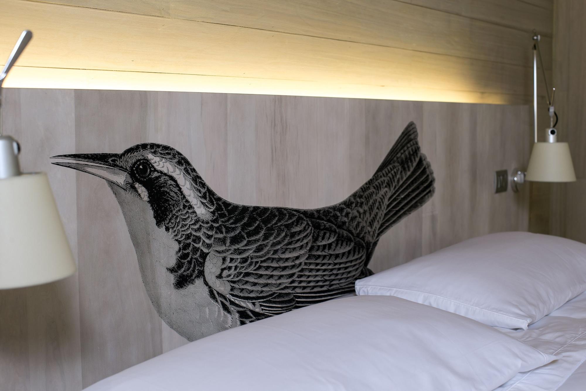 Hotel Magnolia Santiago Exterior foto A bed with a headboard
